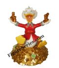 Uncle Scrooge resin figurine on his pile of gold